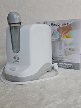 The First Years 2-in-1 Simple Serve Baby Bottle Warmer & Pacifier Sanitizer